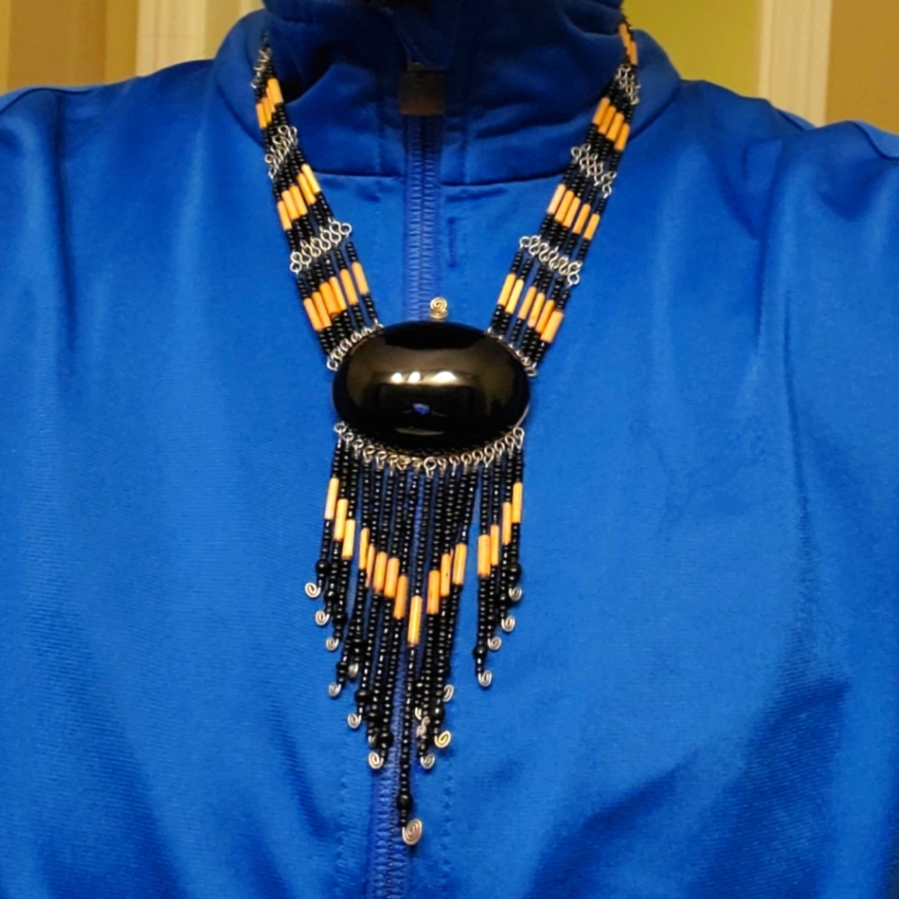 Beaded necklace with large stone